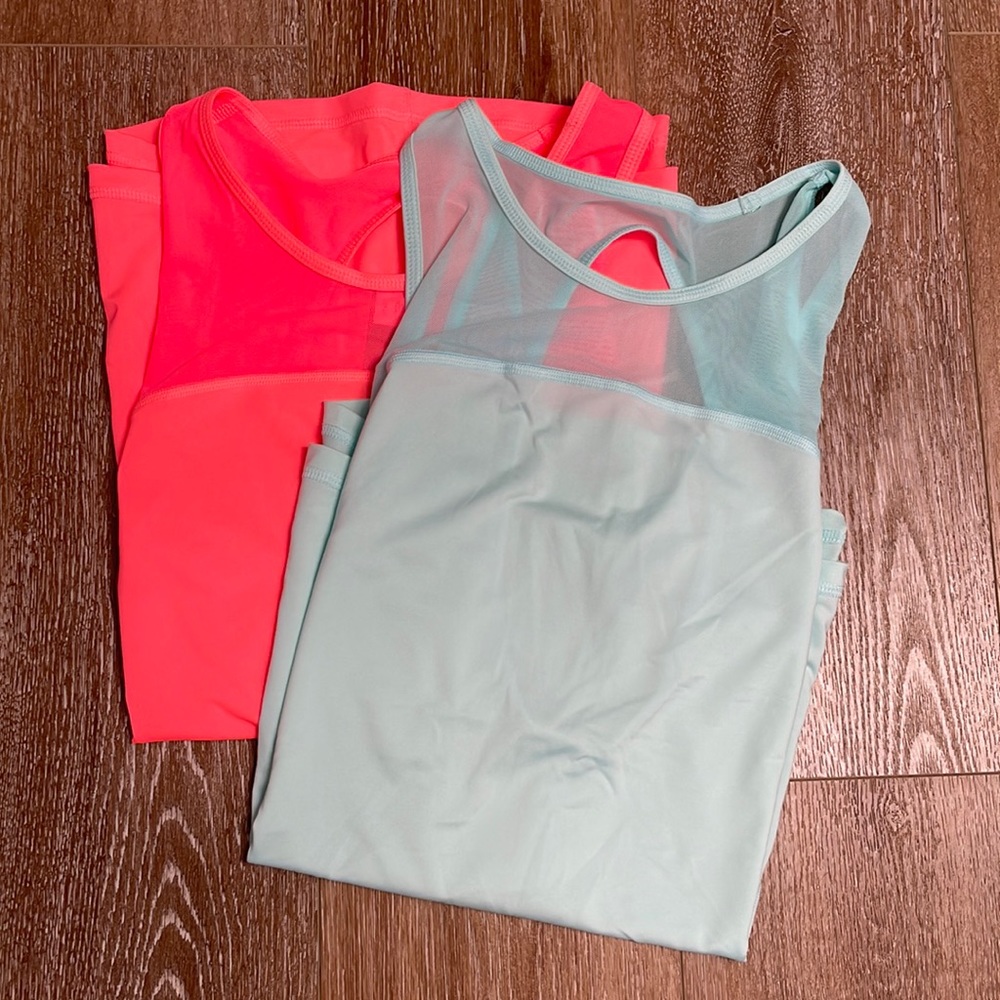 Two Fila sleeveless athletic tops size L